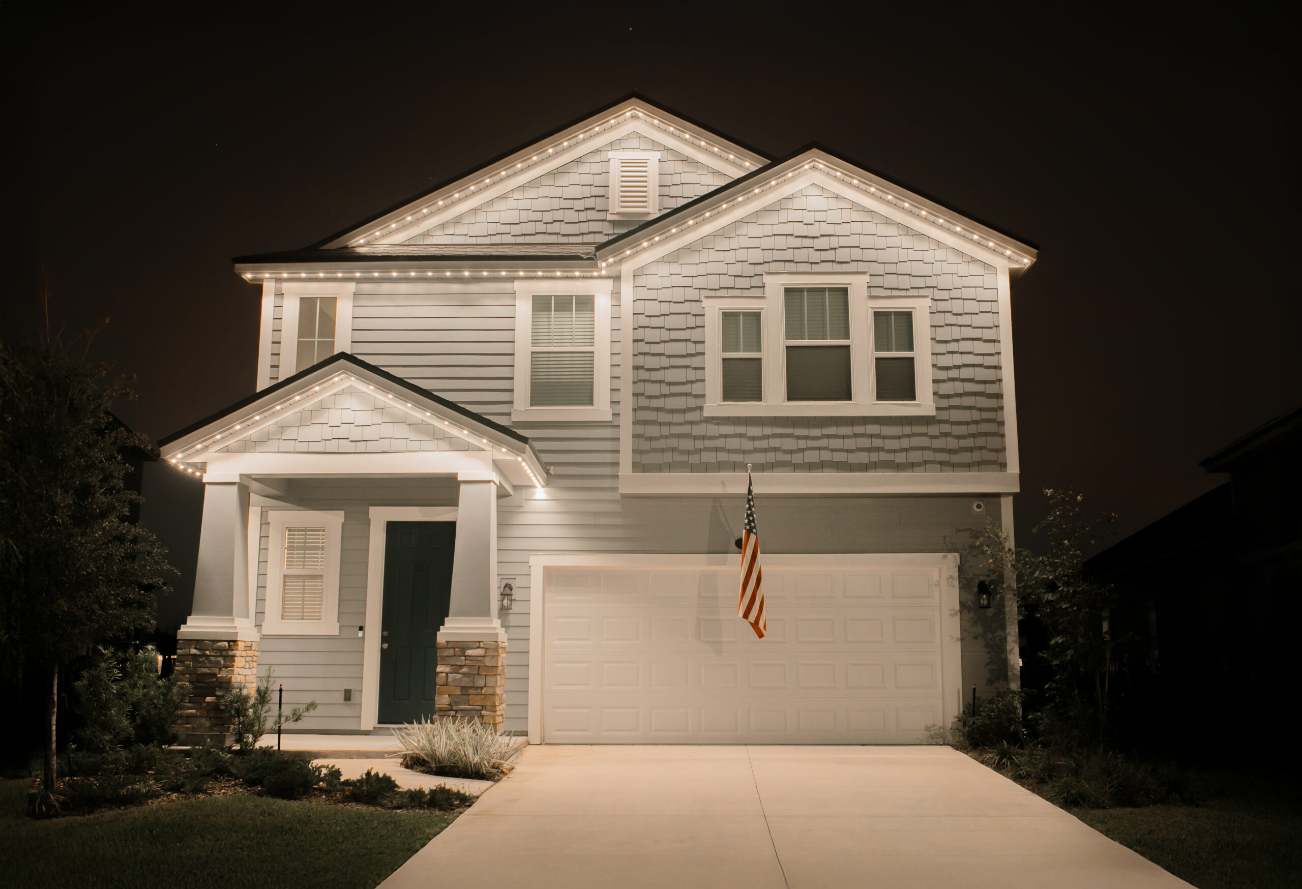 Year-round architectural lighting built into your roofline for events and everyday curb appeal